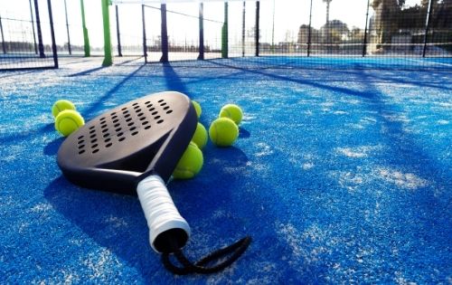 padel bat and court
